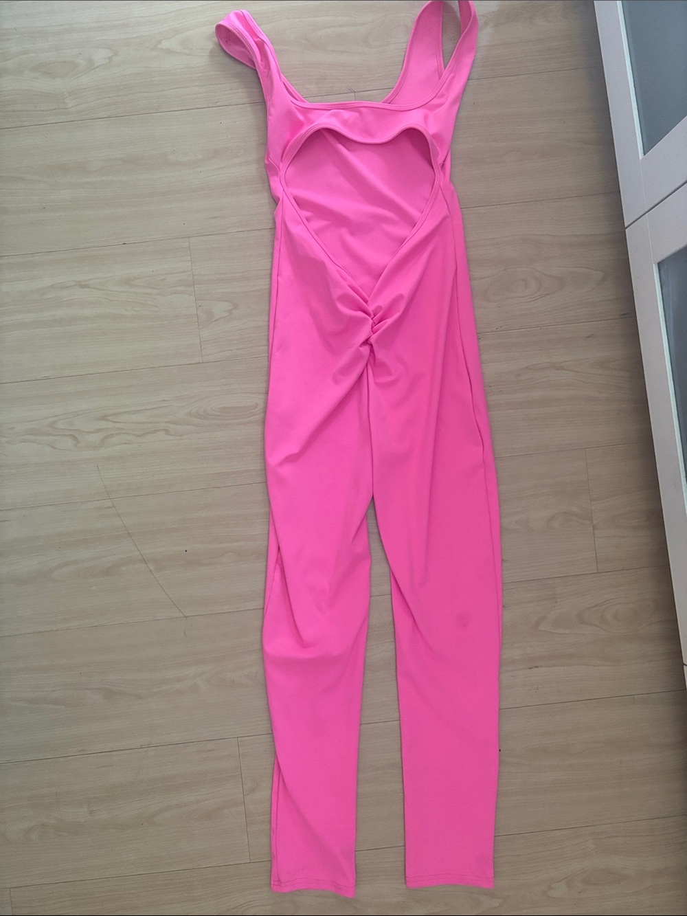 Woman’s Pink One-Piece Jumpsuit with Heart Cutout
